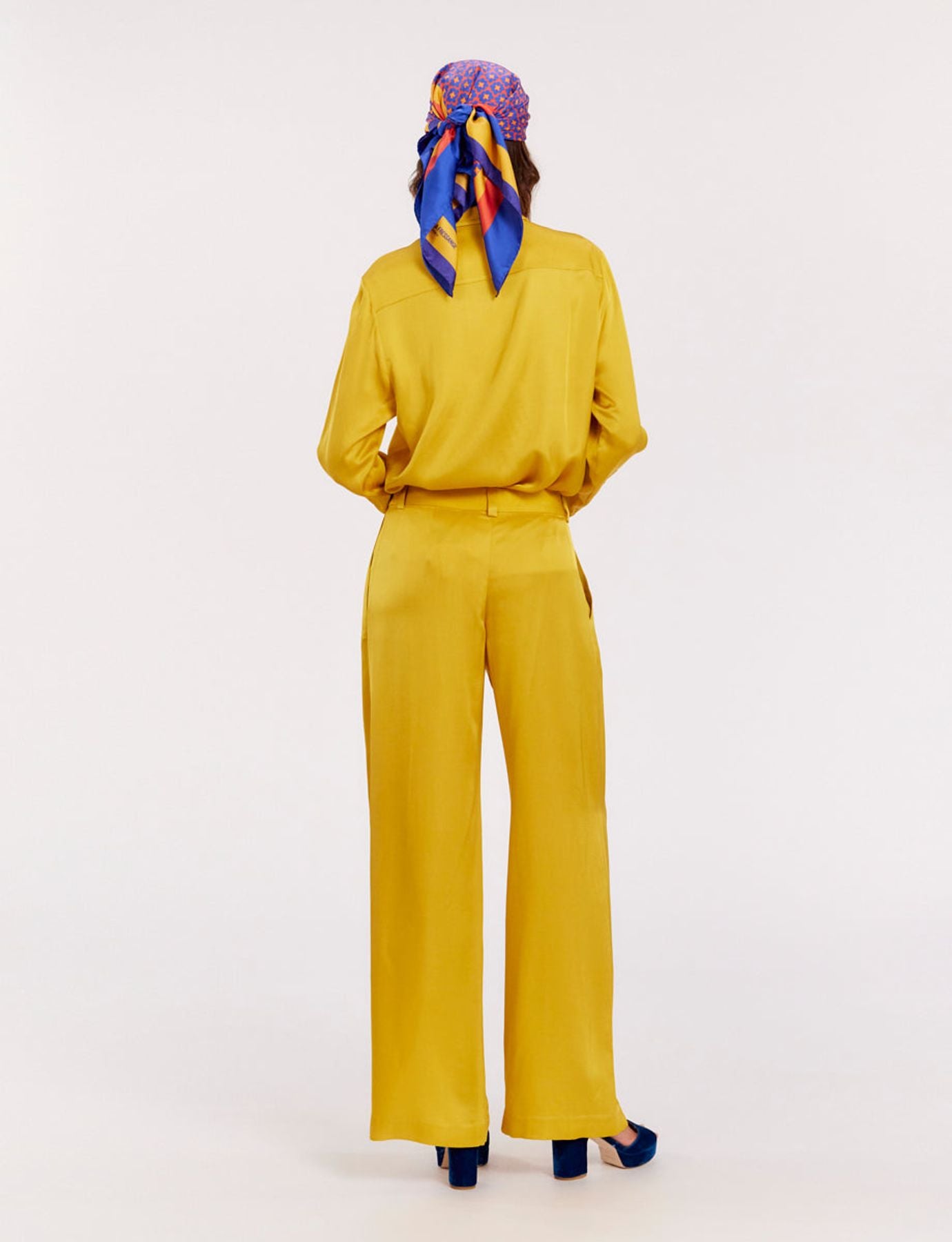 Pantalones Luciano amarillo botón de oro fluido