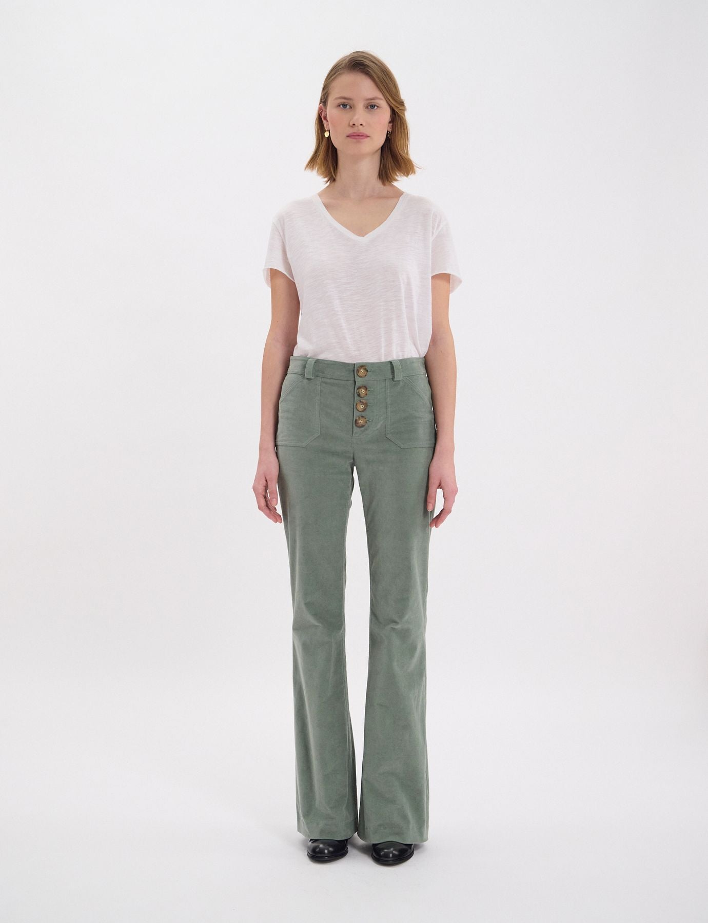 Charlotte trousers in almond green smooth velvet