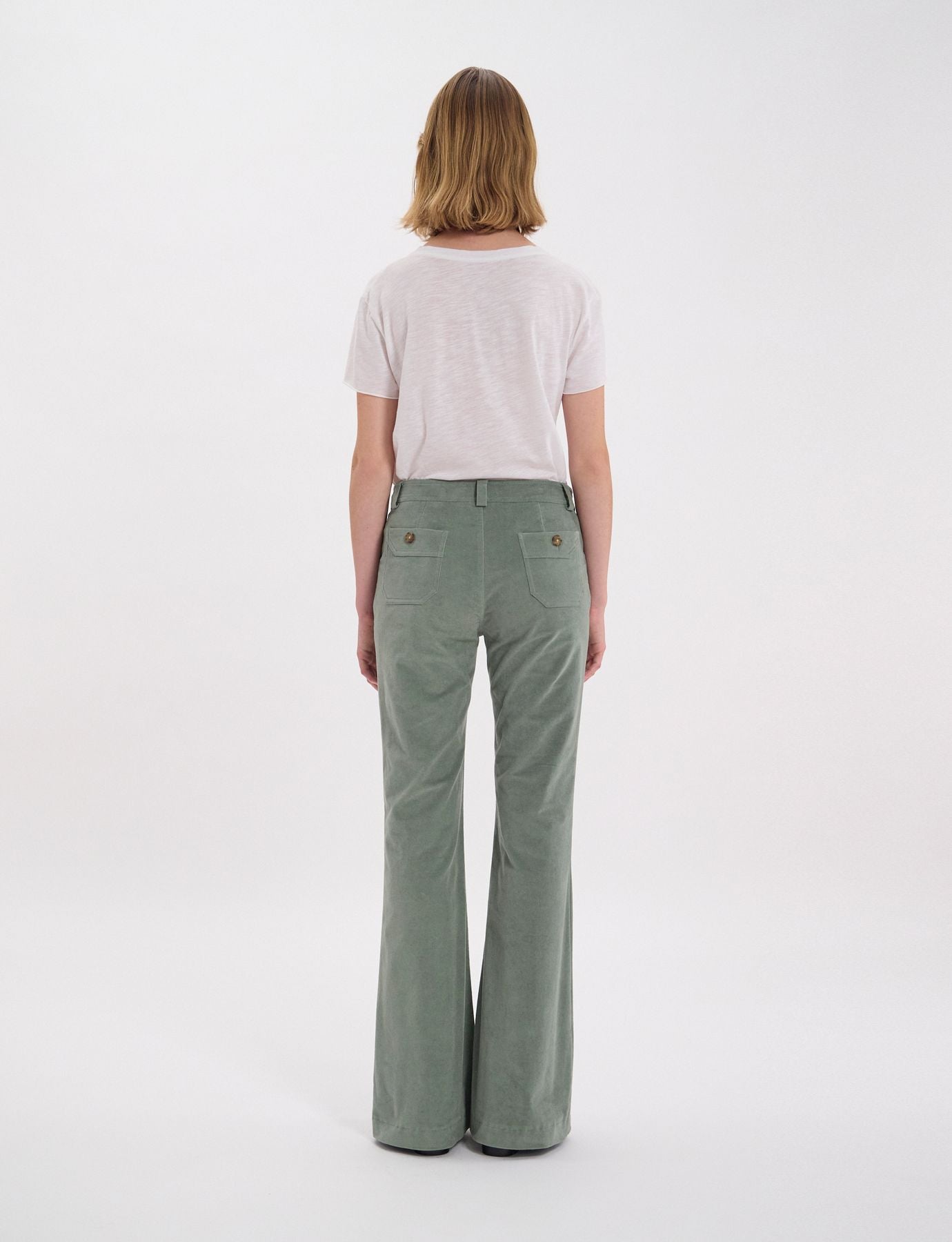 Charlotte trousers in almond green smooth velvet