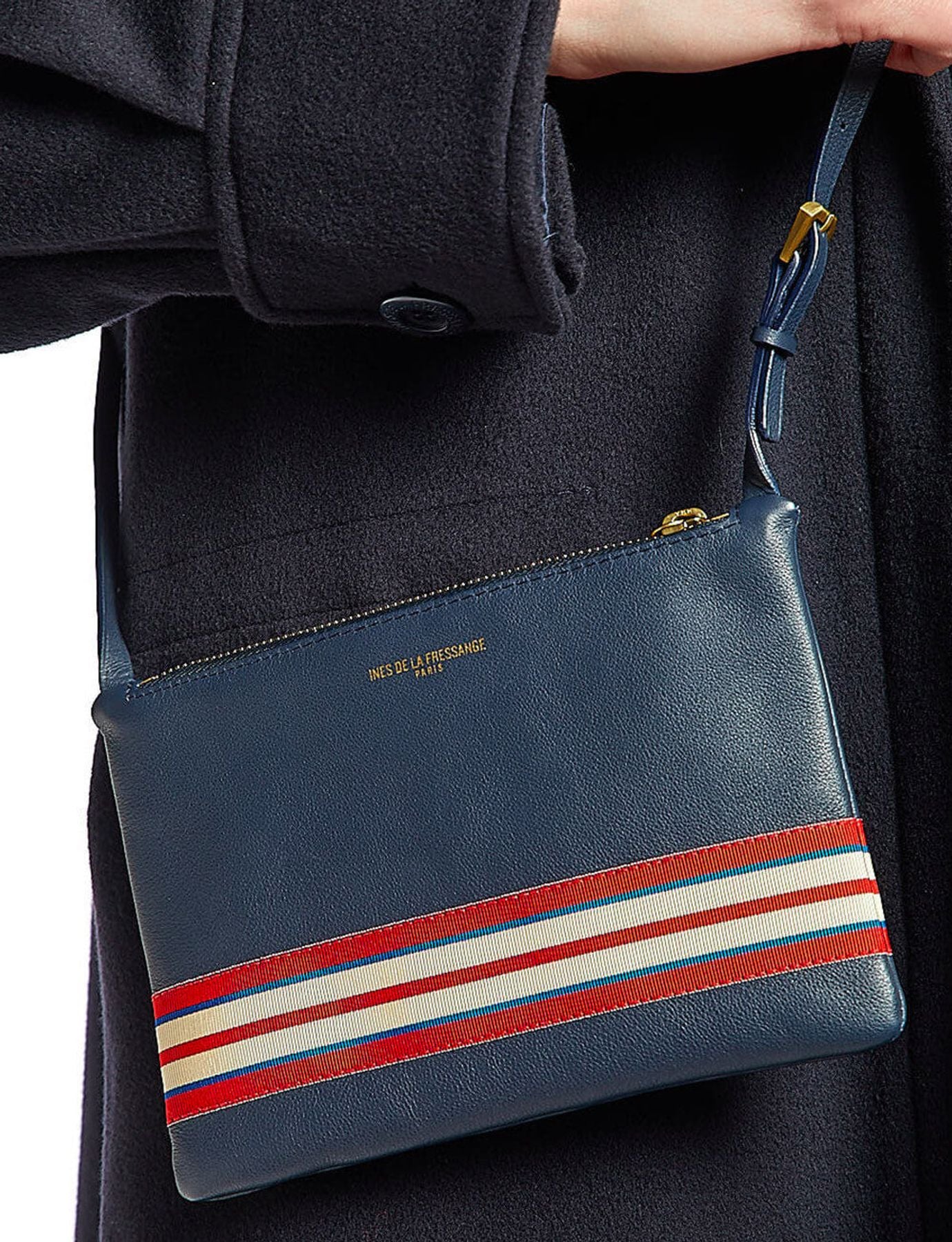 Le Parisien navy leather clutch bag
