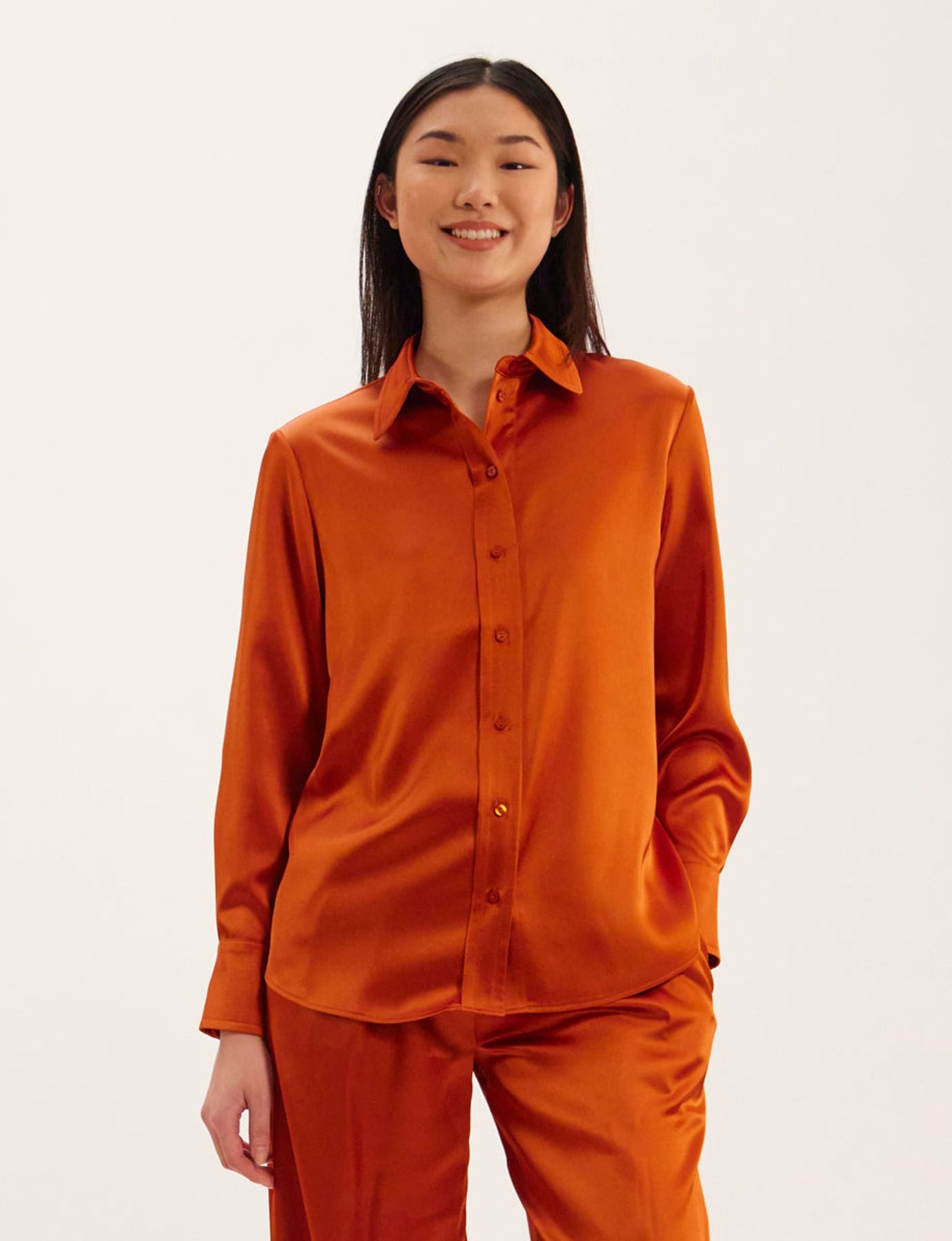Maureen burnt orange shirt