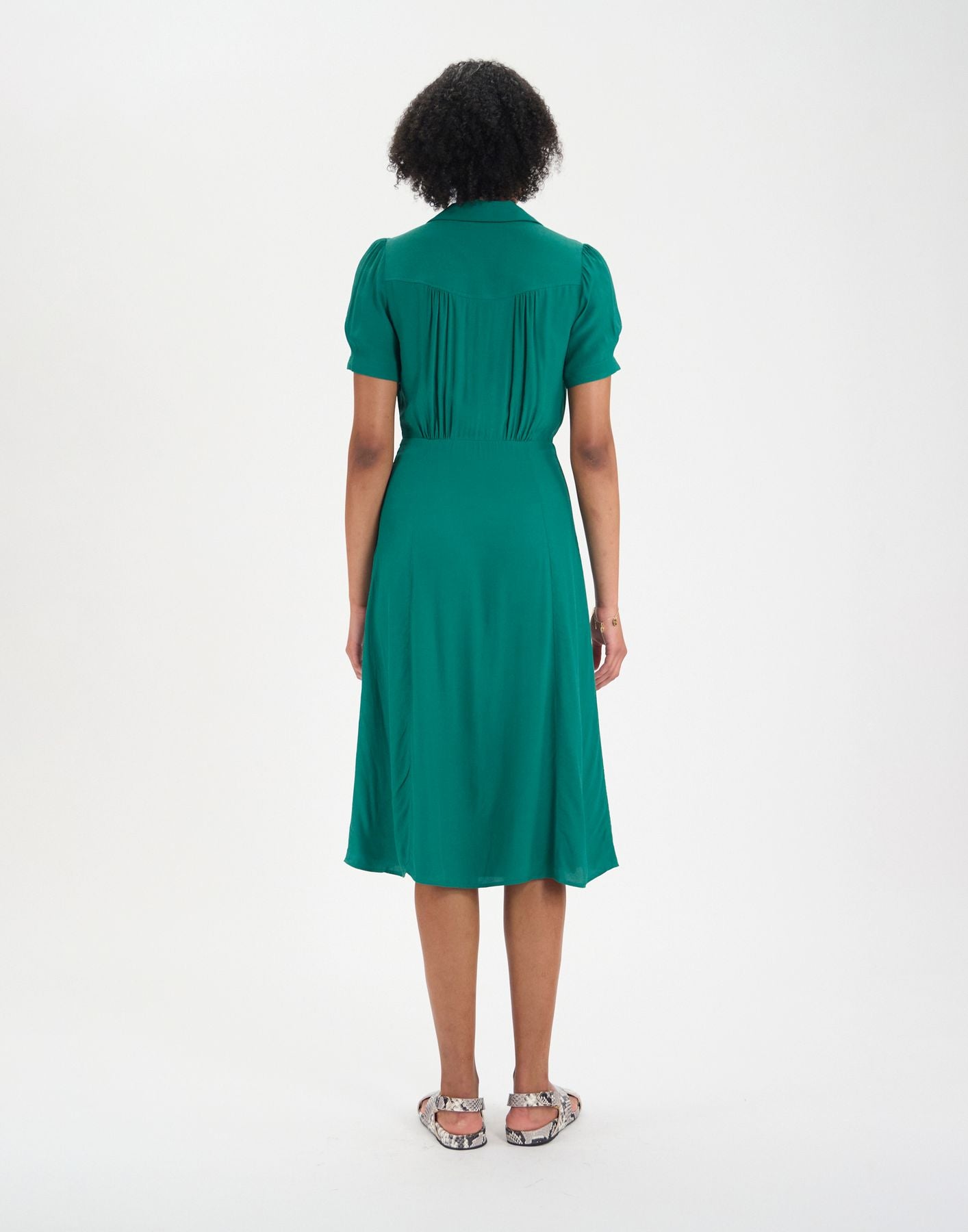 Angèle green dress with oak leaf motif